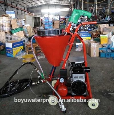 オフィスビル 壁 手持ちのセメント塗装機 モルタル コンクリート噴霧 敷き布団機